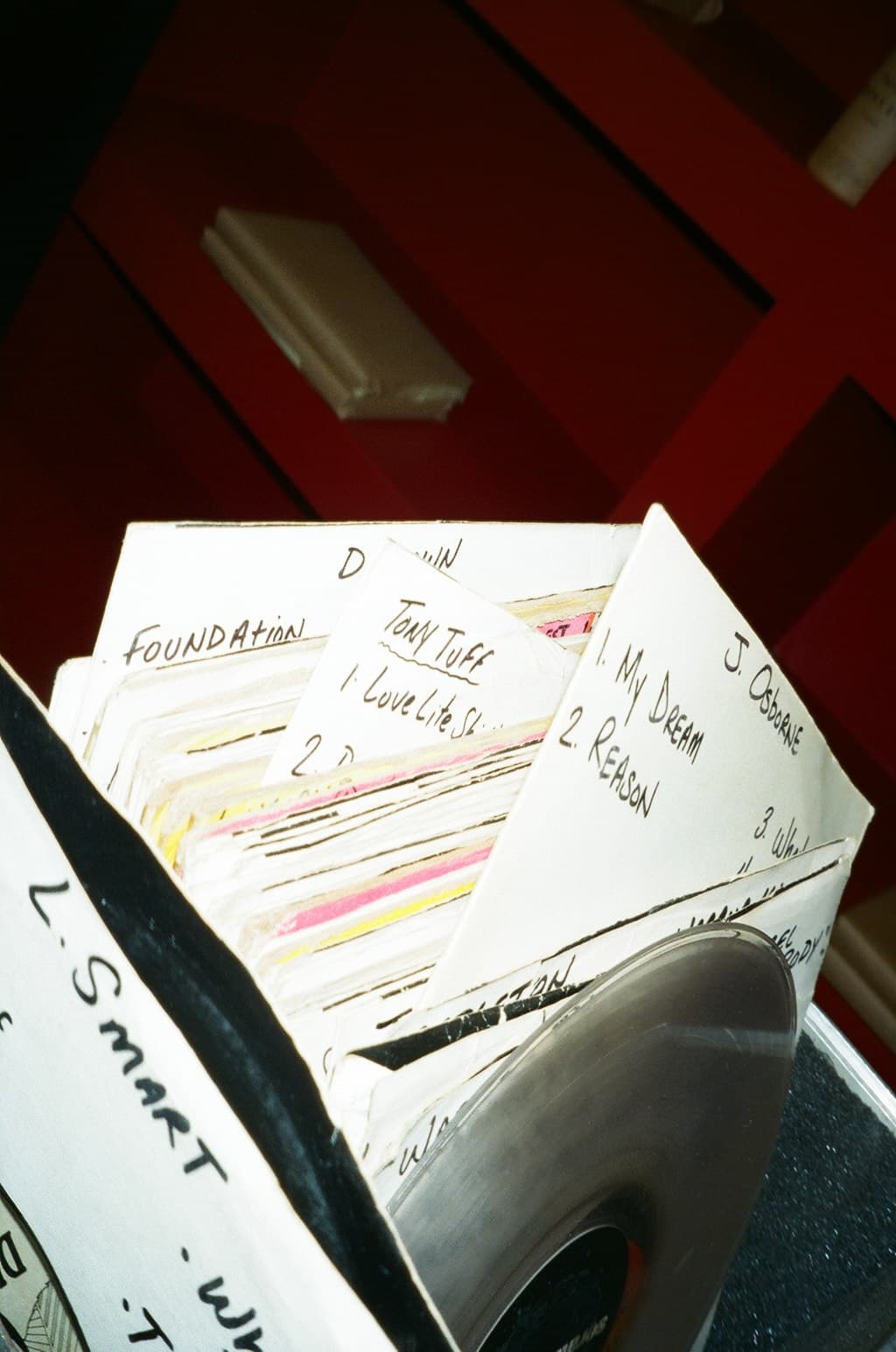 A box of school folders and papers